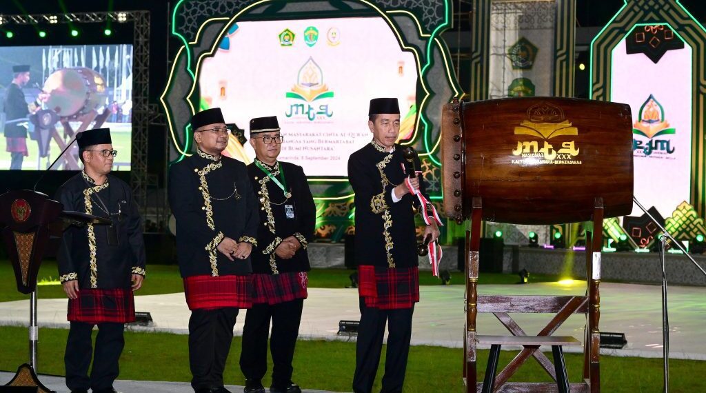 Presiden Jokowi saat membuka perhelatan MTQ Tingkat Nasional ke-XXX Banjarmasin pada Minggu (8/9). Sumber foto : Sekretariat Negara.