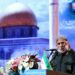 Brigadir Jenderal Esmail Qaani, kepala Pasukan Quds dari Garda Revolusi, berbicara selama upacara peringatan kematian komandan militer senior Iran Mohammad Hejazi, di Teheran, Iran pada 14 April 2022. Sumber foto : Majid Asgaripour/WANA (West Asia News Agency) melalui REUTERS.