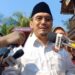 Suswono di hadapan mass media.