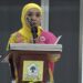 Ketua Panitia Silaturahmi Perempuan Partai Golkar dan Peringatan Hari Ibu, Rita Fitria, saat menyampaikan Laporan Panitia di Aula DPP Partai Golkar Slipi Jakarta pada Jum'at (20/12/2024).
