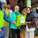 Rustini Muhaimin (Tengah)