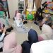 Rustini Muhaimin (tengah)